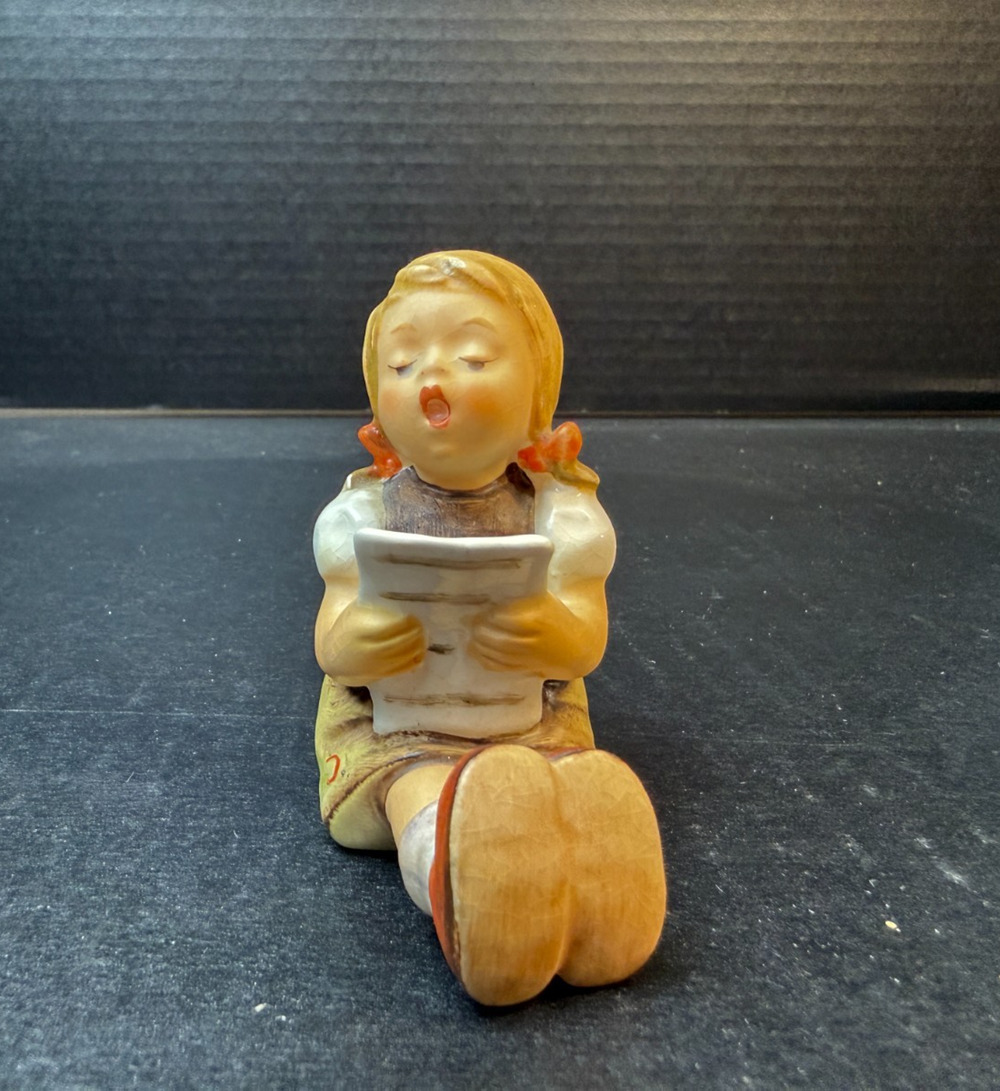 Hummel Goebel "Girl With Sheet Music" Sitting Singing & Reading Figurine #389